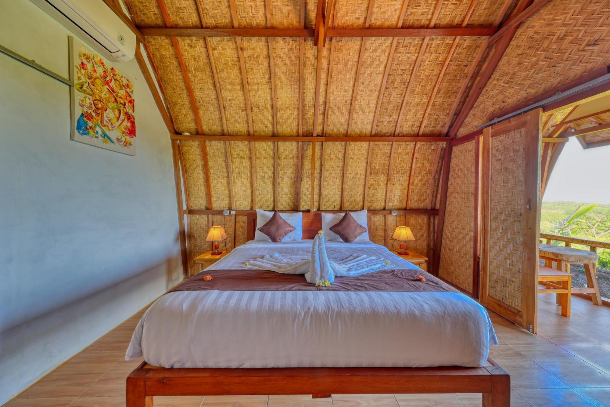 D Sebuluh Bungalow Batumadeg Номер фото