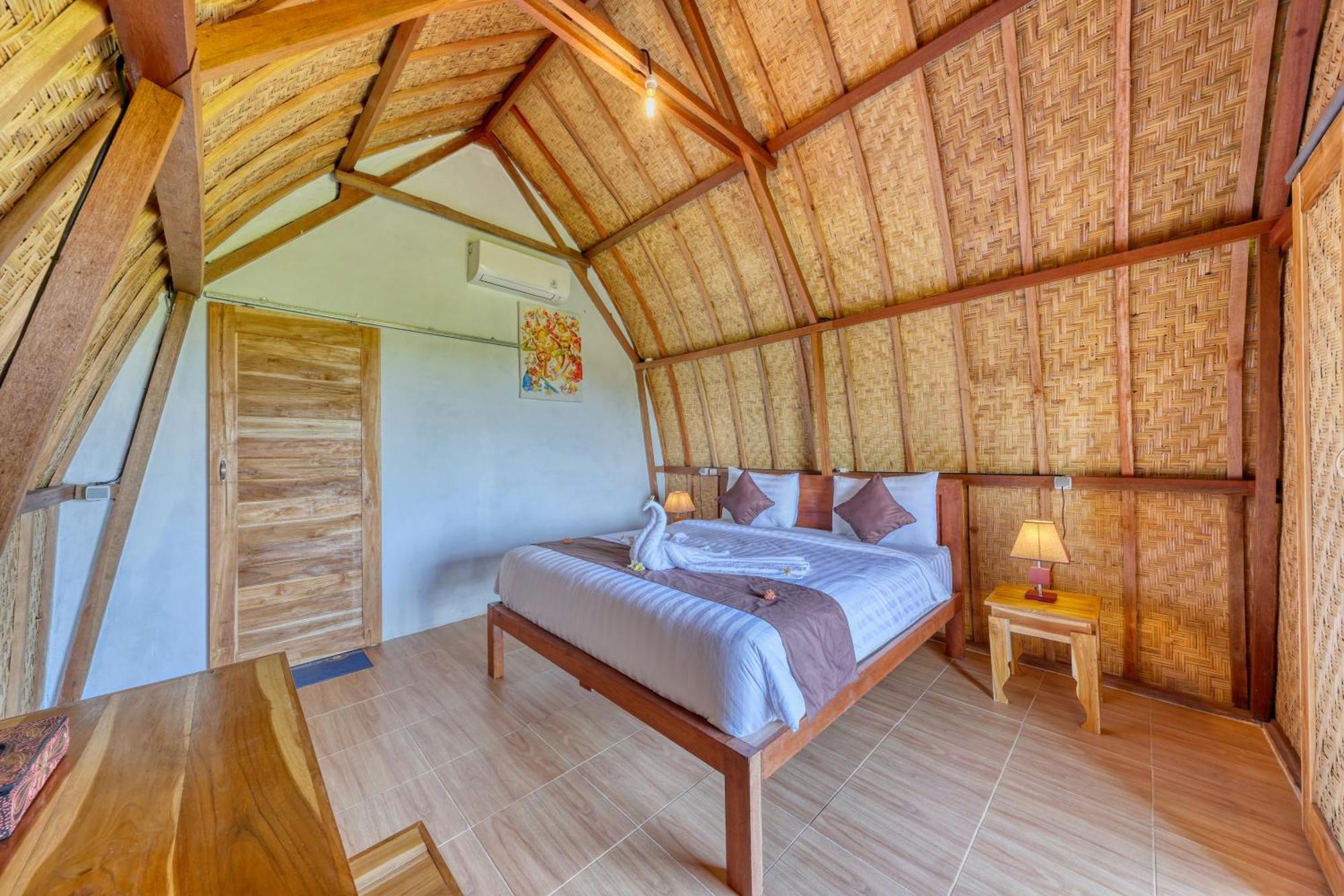 D Sebuluh Bungalow Batumadeg Номер фото